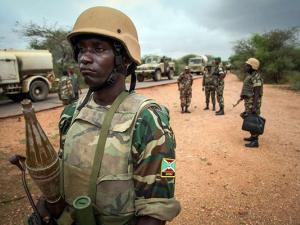 Burundian troops serving with the African Union Mission in Somalia (Amisom) forming a secure perimeter during a patrol near the village of Modmoday, on October 15, 2013. AFP PHOTO | ABDI DAKAN | AU-UN IST